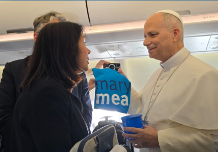 Pope Leo receives a mug and shirt from Mary’s Meals while on plane to Africa