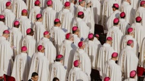 How can lay Catholics spur bishops into action?