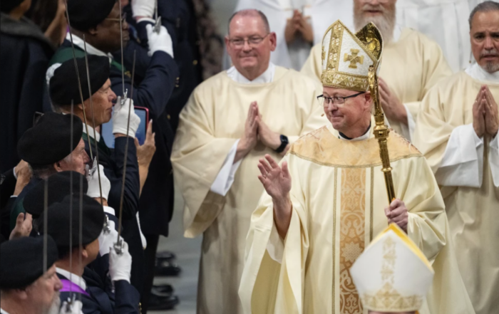 Archbishop James R. Golka blesses members of the congregations during the recessional procession at the end of the Mass of Installation for Golka as the sixth Archbishop of Denver, March 25, 2026, at the CoBank Arena at the National Western Center in Denver. (Credit: Timothy Hurst/The Denver Post via AP.)