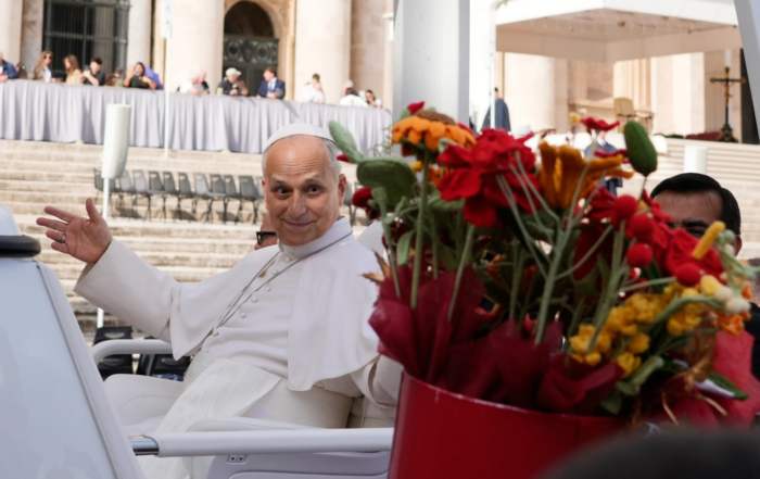 Pope Leo XIV is presented with flowers as he leaves at the end of the general audience in St. Peter's Square at The Vatican, Wednesday, Oct. 21, 2026. (Credit: Gregorio Borgia/AP.)